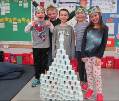 students cup stacking