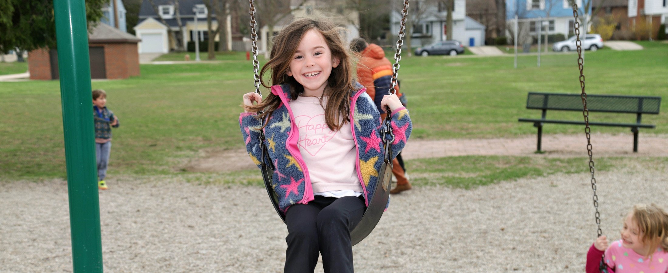 Cumberland student on a swing