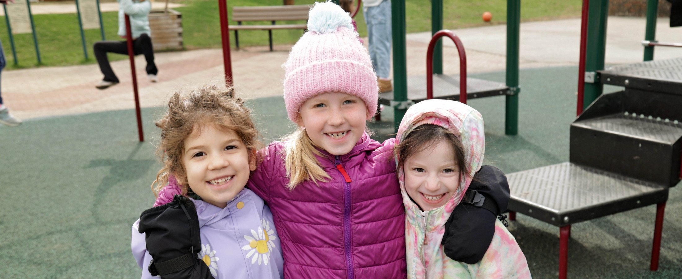 Three students on the playground
