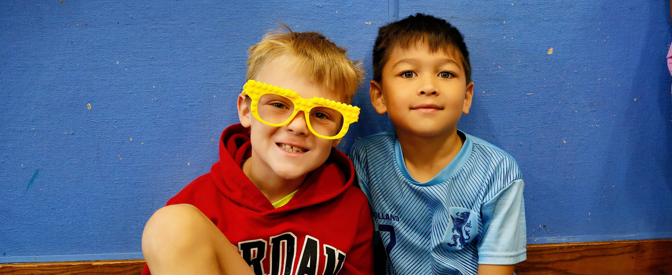 Two students smiling