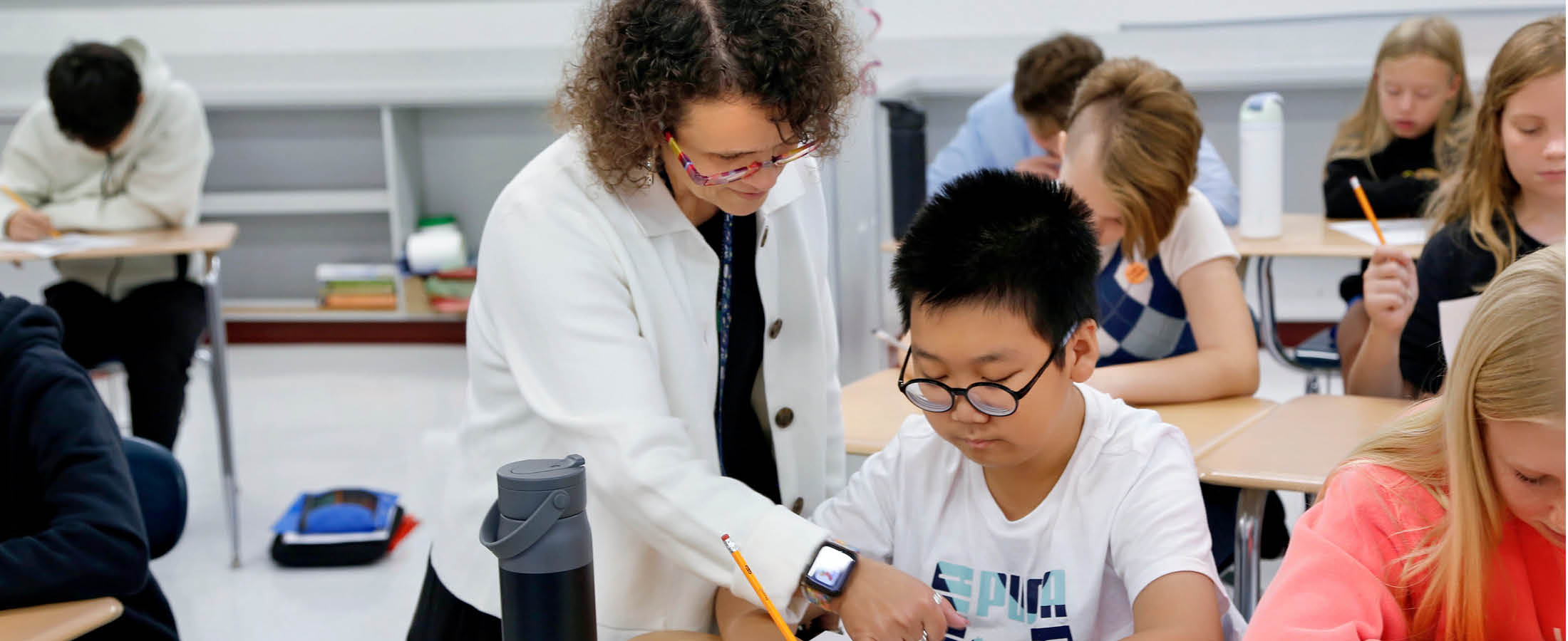 Student and teacher working together