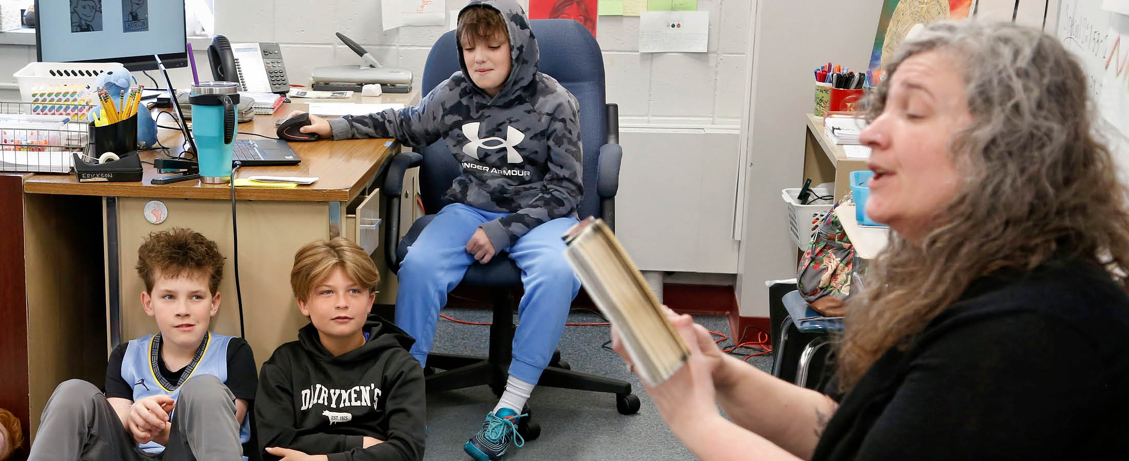 Students and teacher reading