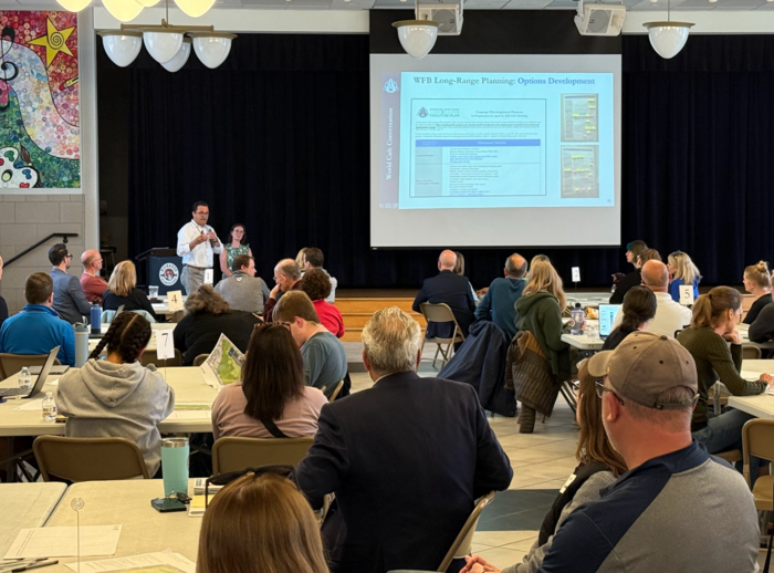 Participants learn about options at the World Café Conversation