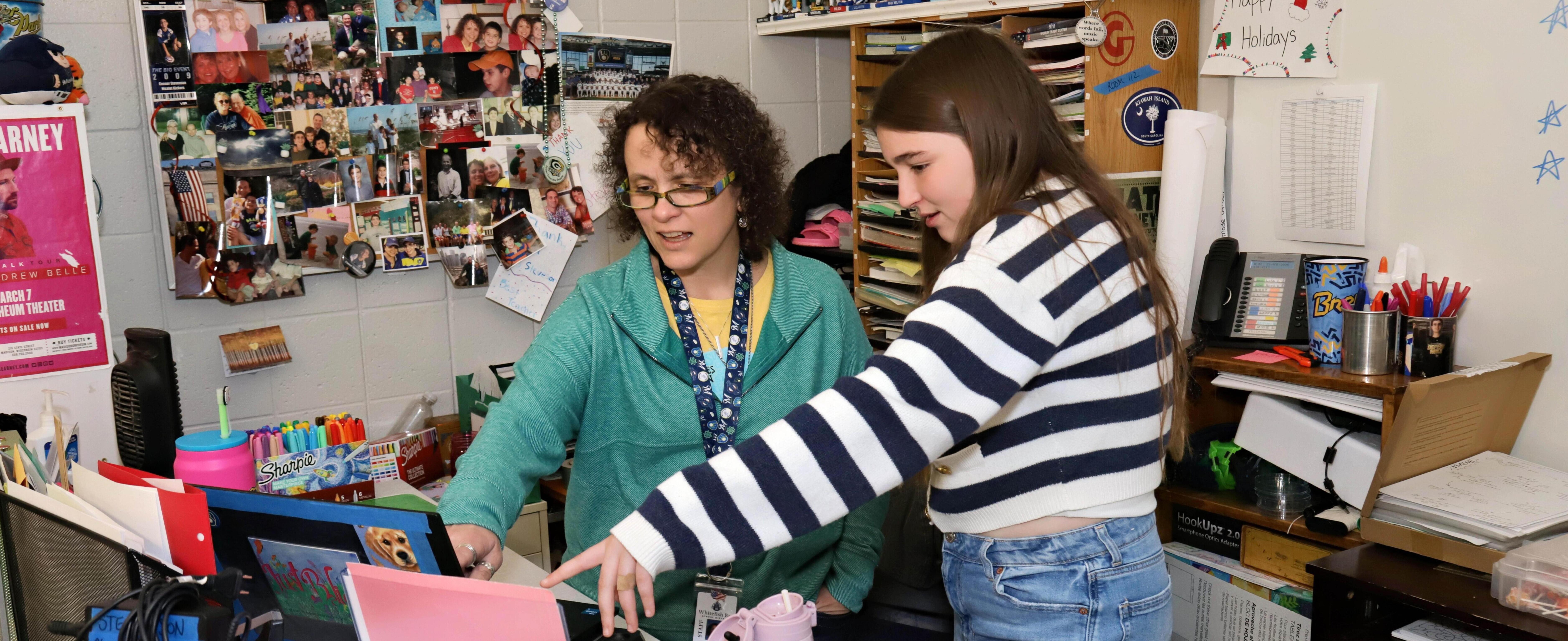Student and teacher collaborating