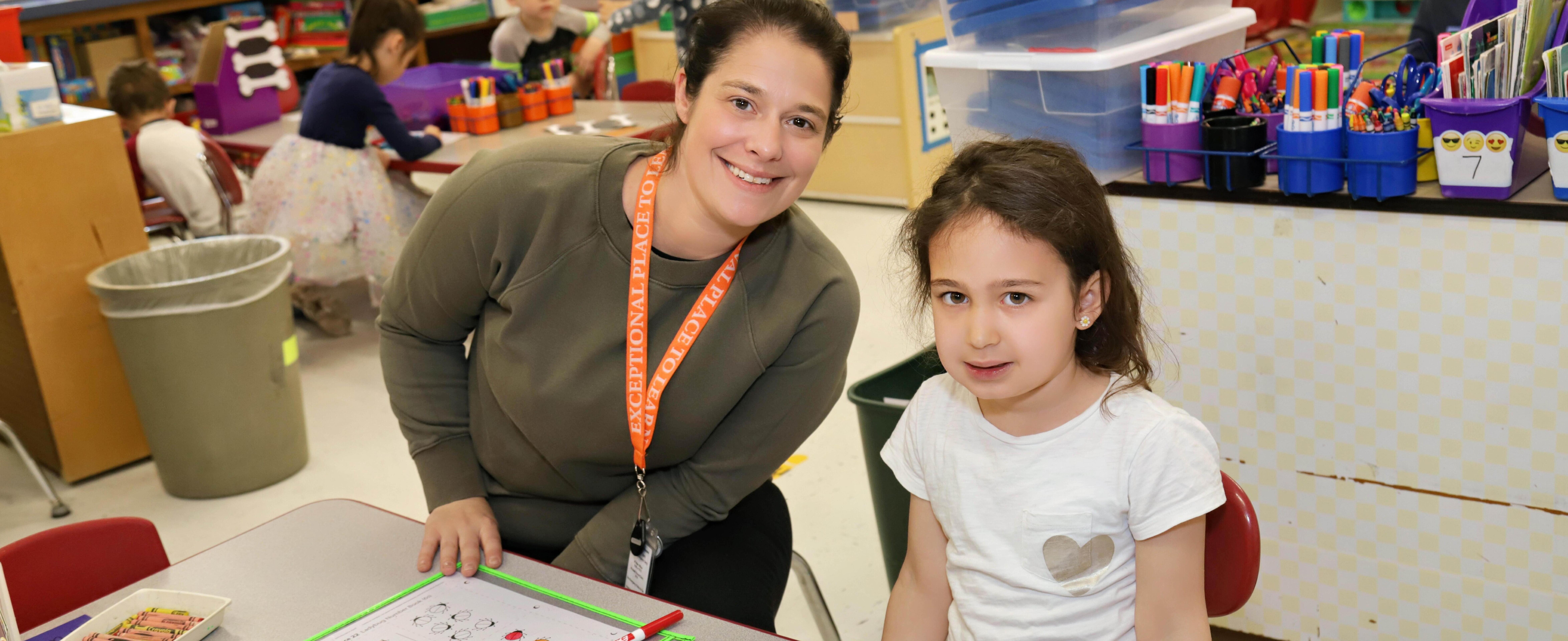 Student and teacher collaborating