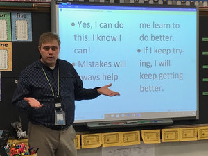 teacher using smartboard for lesson