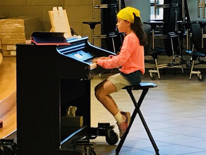 student playing piano