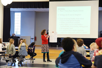 Author presenting to students