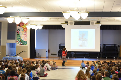 Author presenting to students