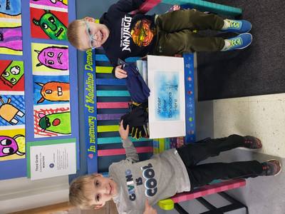 Students with the Mitten Drive box
