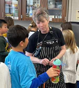 Teacher in art class
